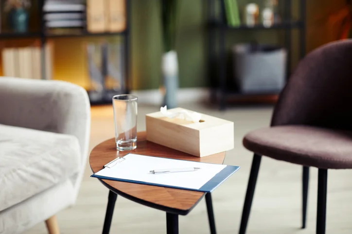 counsellors room with clipboard and box of tissues