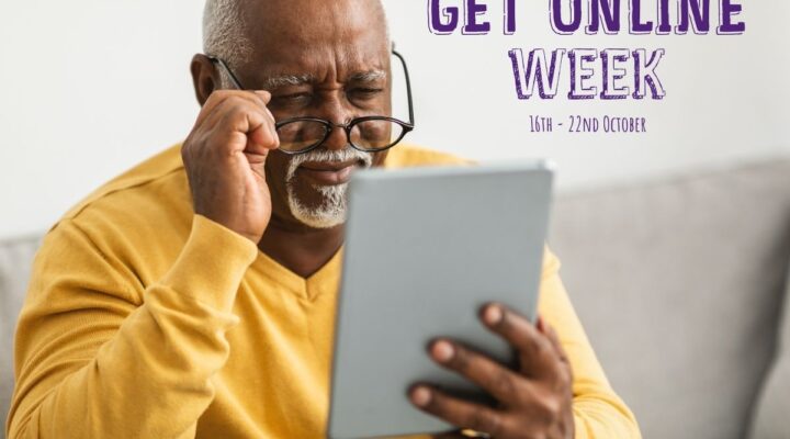 Text reads Get Online Week 2023. Picture shows an older black man looking at a tablet computer.