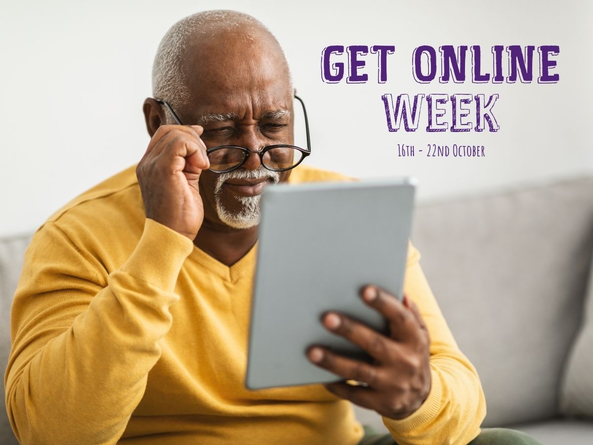 Text reads Get Online Week 2023. Picture shows an older black man looking at a tablet computer.