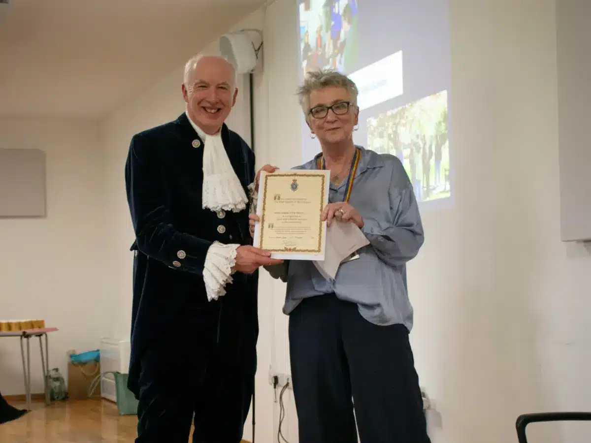 Receiving certificate from high sheriff