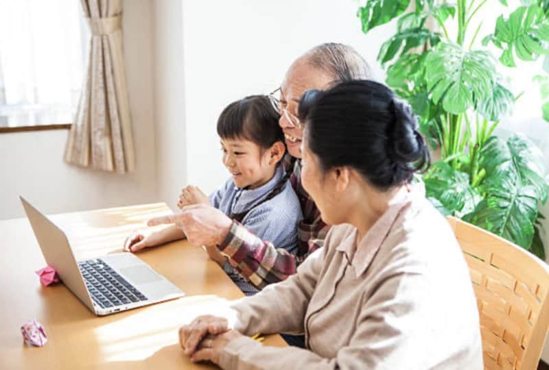 people using a laptop