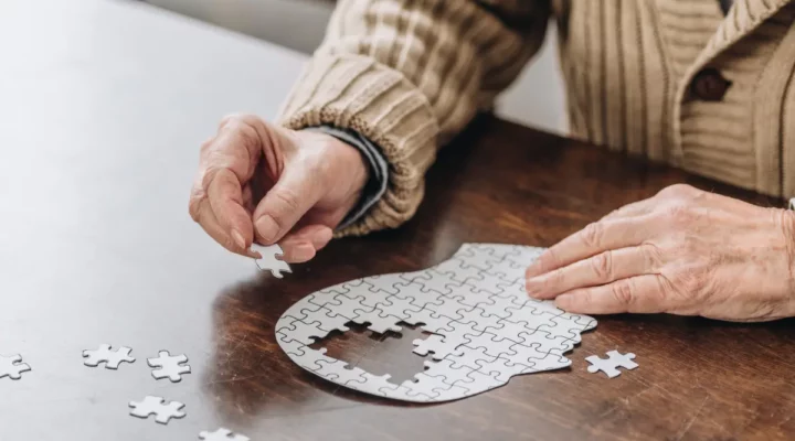 puzzle of head with pieces missing