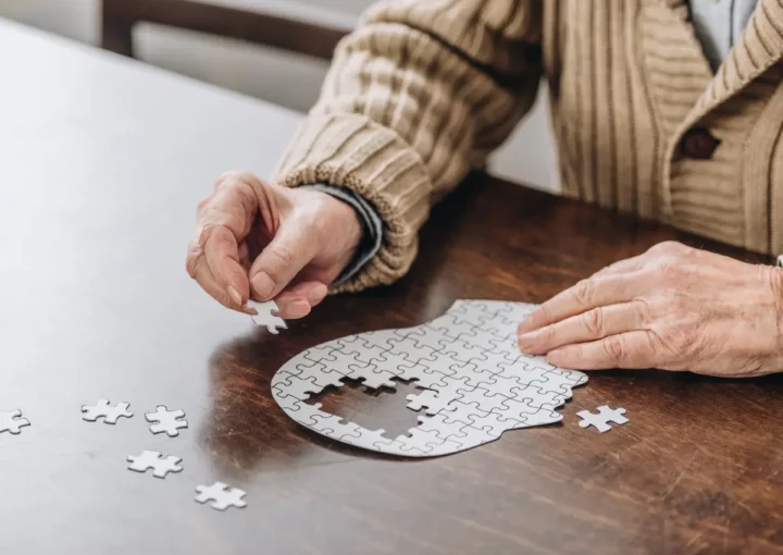 puzzle of head with pieces missing