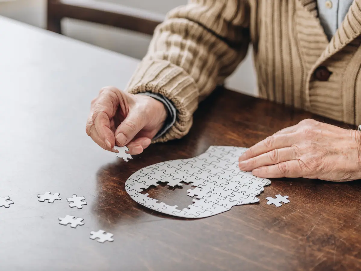 puzzle of head with pieces missing